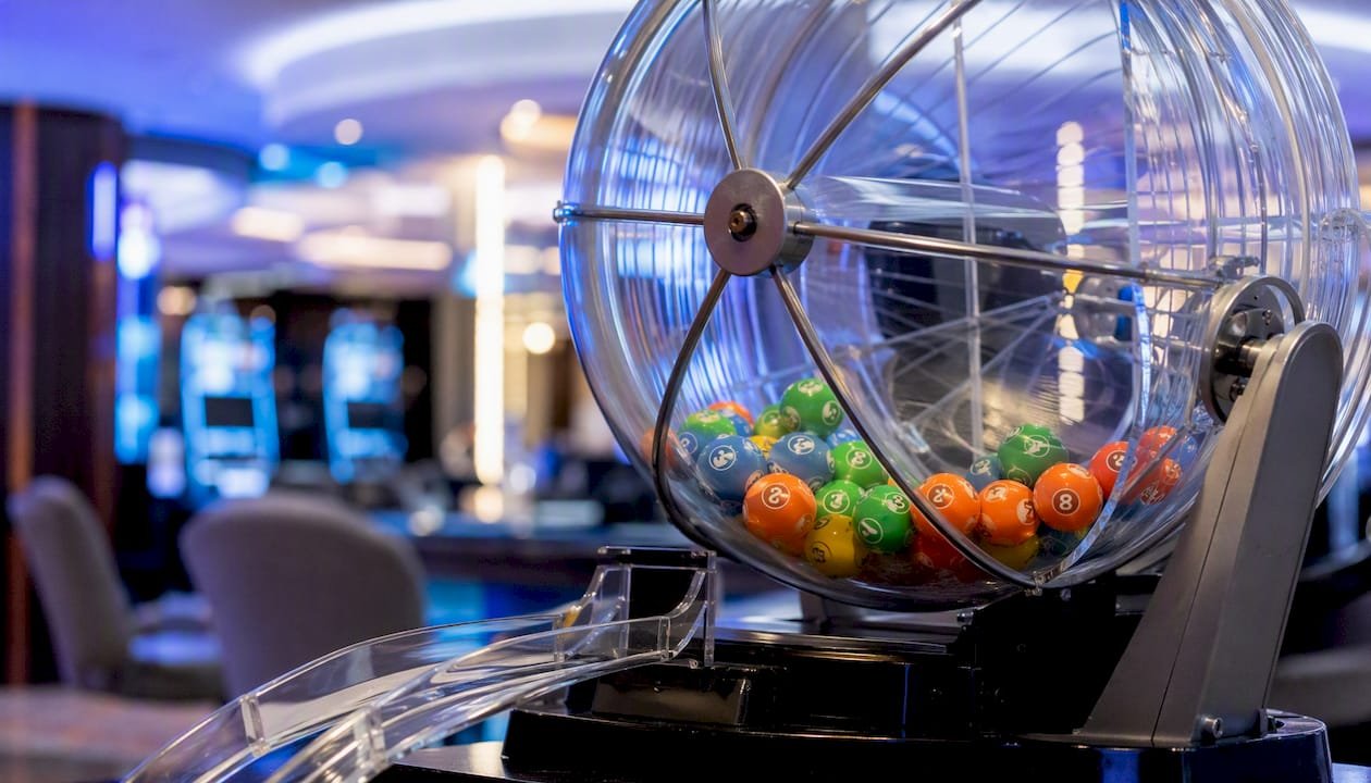 Keno ball cage with numbered balls during draw