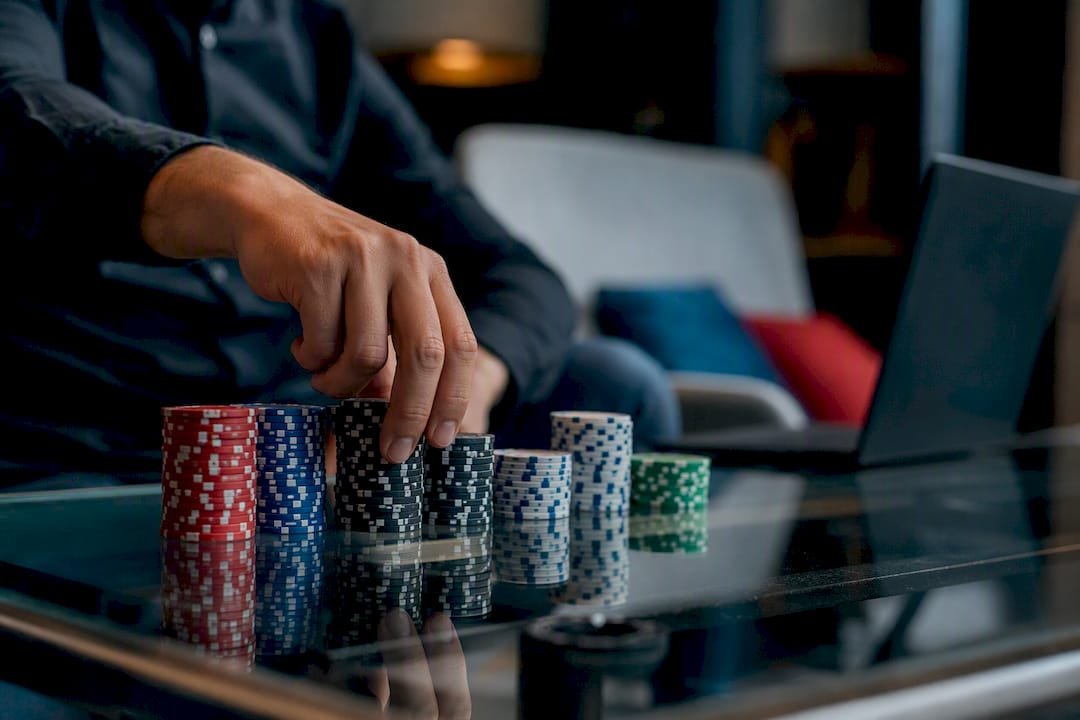 Casino chips grouped by betting units on table